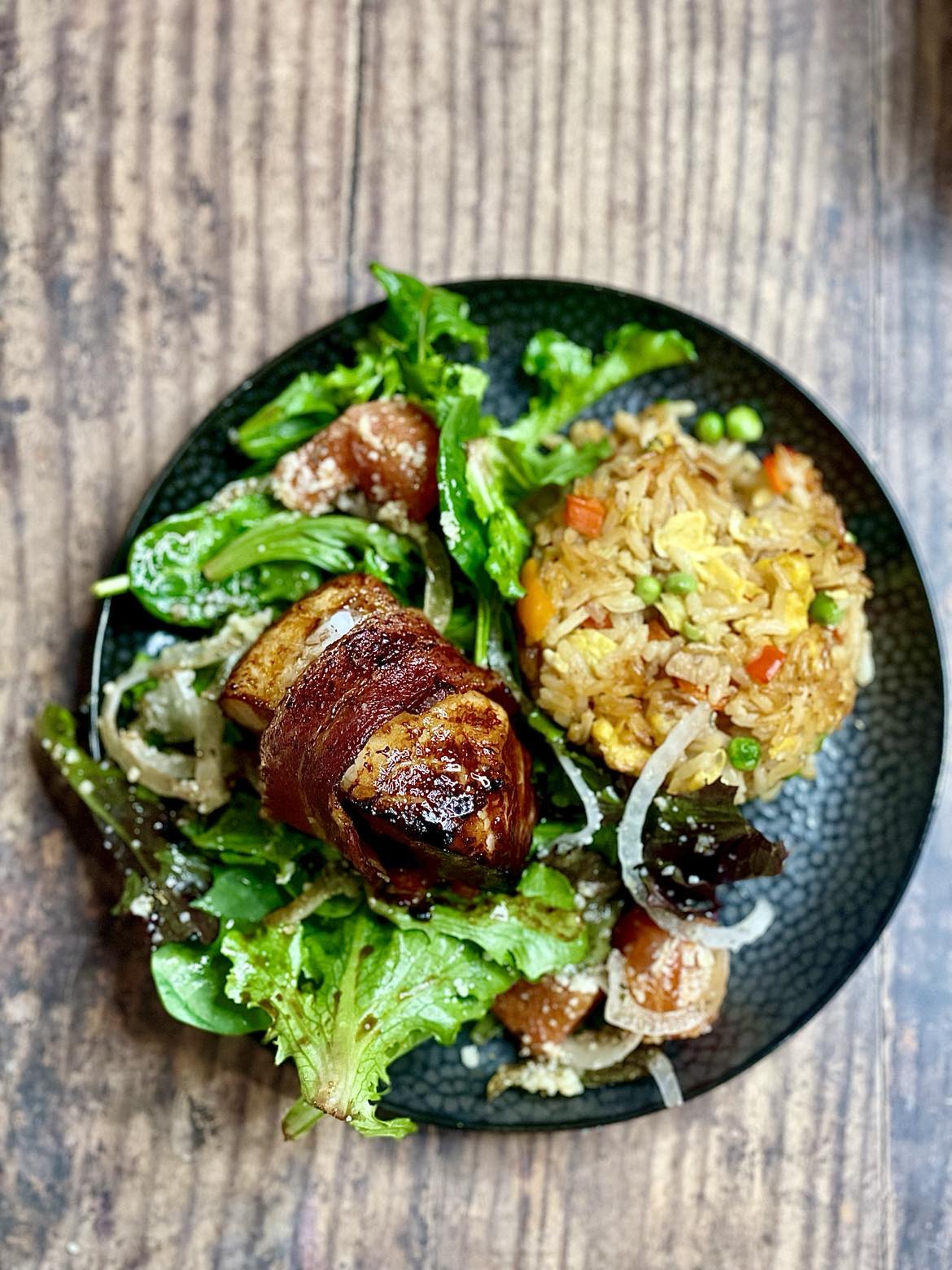 Bacon Wrapped Chilean Sea Bass Over Simple Green Salad