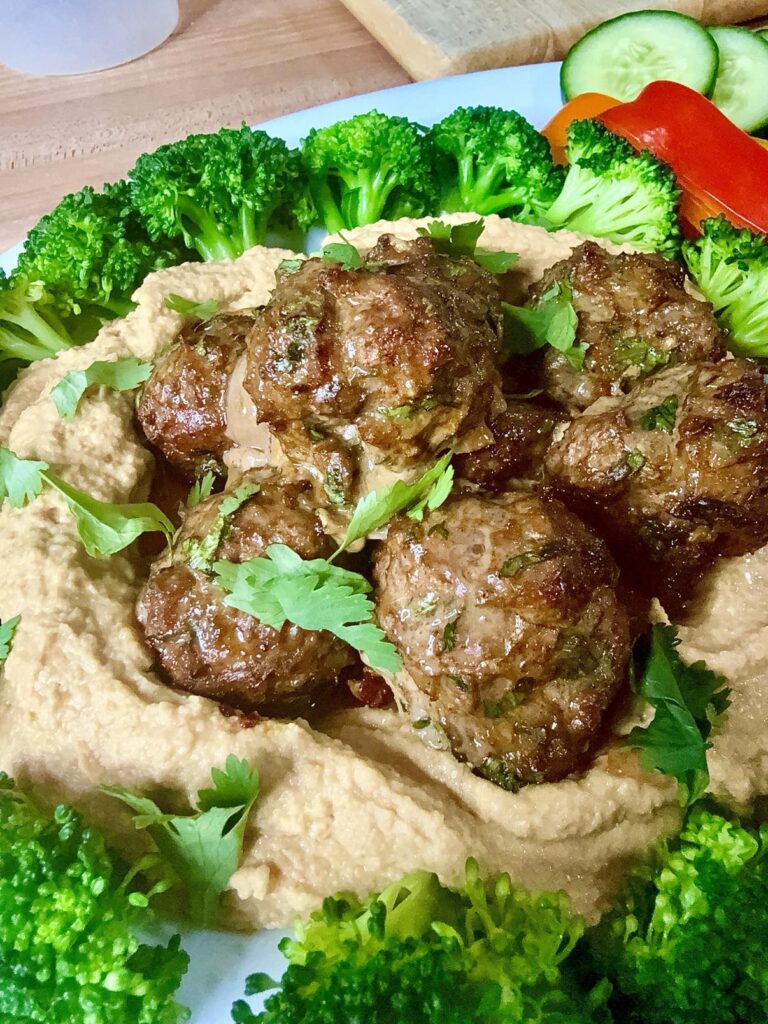 Moroccan Meatballs Over Chili Crisp Hummus